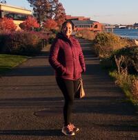 Amrita Chakravarty standing in outside setting