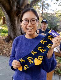 Raffle prize winner holds up Cal socks