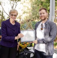 Vice Chancellor for Research Dr. Katherine Yelick presents the faculty postdoc mentor award to Adrian van Kan for Professor Knobloch