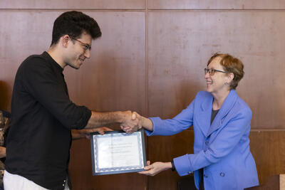 Postdoc Achievement Award presented by Dr. Katherine Yelick to Dr. Dimitrios Fraggedakis